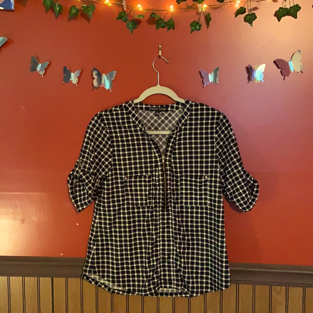 Cute black and white plaid zip up blouse.